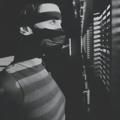 Person Looking Out Slats