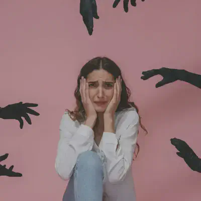Woman Sitting on Ground