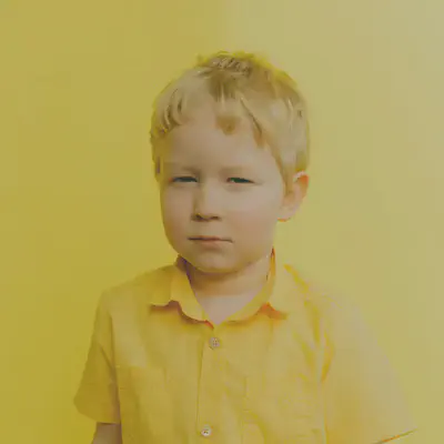 Boy In Yellow Shirt