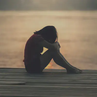 Woman on Pier by Sea